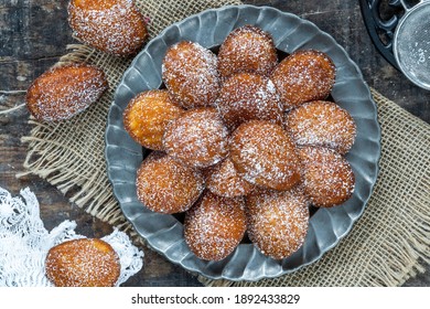 Traditional Madeleines Cakes Dusted With Icing Sugar - Overhead View