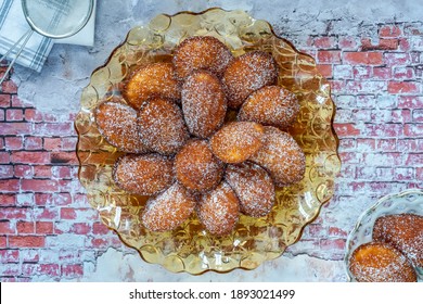 Traditional Madeleines Cakes Dusted With Icing Sugar - Overhead View