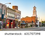 Traditional main street downtown of quaint rural USA small town in midwest America with storefronts and clock tower Paxton Illinois America