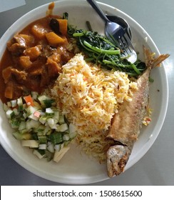 Traditional Malaysian Nasi Biriyani And Fish Fry