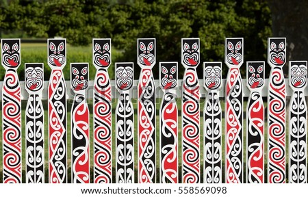 Traditional Maori carving at Whakarewarewa marae (meeting ground) in Rotorua, New Zealand. Maori art detail photo. Maori culture