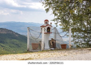 Traditional And Memorial Roadside Small Chapel Altar Or Shrine On The Side Of The Road In Greece, Meteora Region