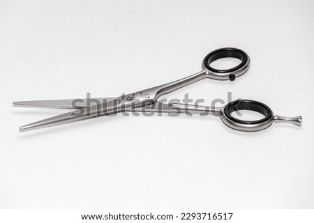 Traditional metallic scissors isolated on white background