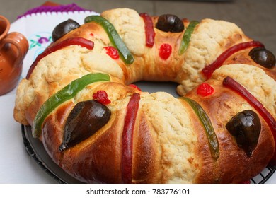 Traditional mexican bread, Rosca de Reyes, Kings cake with figs and sugar crust