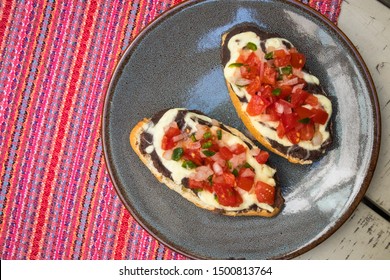 Traditional Mexican Breakfast Of Molletes Served In Mexico City (Overhead)