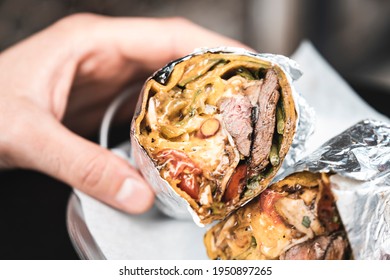 Traditional Mexican flavor is cooked and served in burritos with an intense mixture of meat and vegetables.
