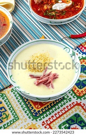 Traditional mexican food. Cream cheese soup with ham. Colorful Food Table Celebration Delicious Party Meal Concept. 
