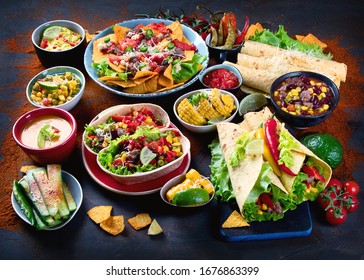Traditional Mexican food mix on dark background. 