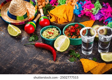 Traditional Mexican food nachos, salsa, guacamole, tequila. - Powered by Shutterstock