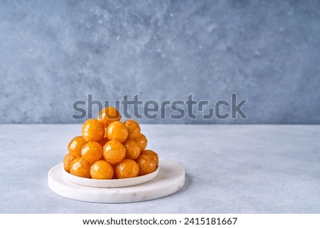 Traditional middle eastern fried sweets lokma, awameh, luqaimat. Ramadan dessert . Closeup