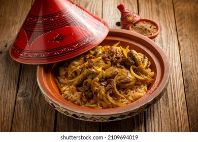 traditional moroccan chicken tajine with rice and vegetables