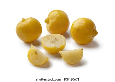 Traditional Moroccan Preserved Whole And Half Lemons Isolated On White Background