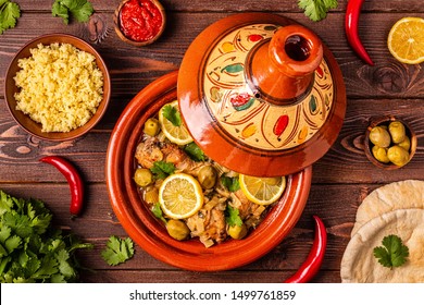 Traditional moroccan tajine of chicken with salted lemons, olives. Top view. - Powered by Shutterstock