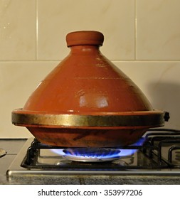 Traditional Moroccan Tajine Pot On Gas Cooker