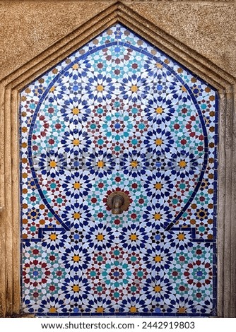 Traditional mosaic tiles known as zellij on a street fountain in Rabat, Morocco 