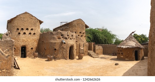 Traditional Mud Built Houses In Gaoui, Chad N'Djamena. Old Ancient Houses, Located In Sahel Desert And Sahara. Hot Weather In Desert Climate On The Chari River.