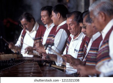 A Traditional Music Band Plays In A Restaurant In The Old City In The Town Of Antigua In Guatemala In Central America. 
Guatemala, Antigua, September, 2014