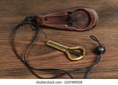 Traditional Music Instrument Komus Of Altai And Yakut People . Jaw Harp. Jew's Harp.