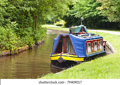 Traditional Narrow Boat Moored On The Banks Of The Llangollen Canal In Wales, Uk.