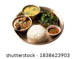 Traditional Nepalese food - thali (dal bhat) isolated on white