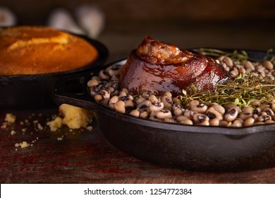 Traditional New years meal black eyed peas and ham hock with cornbread.