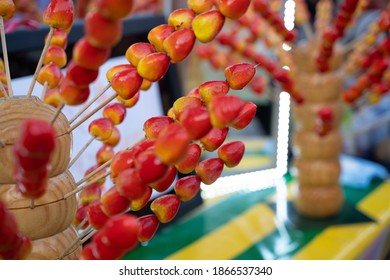 Traditional Northern Chinese Snack Of Candied Chinese Haw Berry In Market