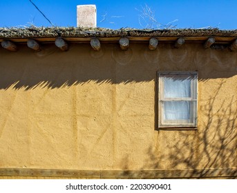 Traditional old adobe house with a beautiful window from Turkey.
