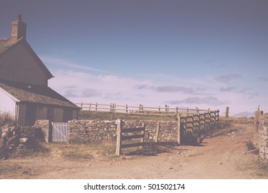 Traditional Old Farmhouse In The Cornish Countryside, England Vintage Retro Filter.