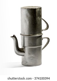 Traditional Old Italian Neapolitan Coffee Maker Or Flip Pot For Brewing Coffee With Boiling Water With Dents In The Metal Over A White Background