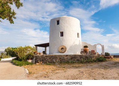 Traditional Old Windmill Located In Triovasalos Village On Milos Island. Cyclades, Greece.