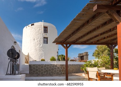 Traditional Old Windmill Located In Triovasalos Village On Milos Island. Cyclades, Greece.