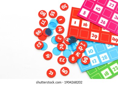 Traditional old-style family board lotto game, bingo, tombala with cardboard folders and numbers for new year and christmas celebrations.
