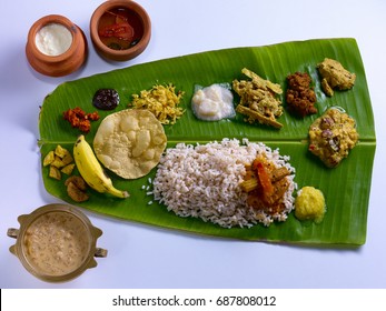 Traditional Onam Sadya Served On A Banana Leaf On Festival Day In Kerala