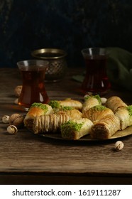 traditional oriental sweets baklava with nuts - Shutterstock ID 1619111287