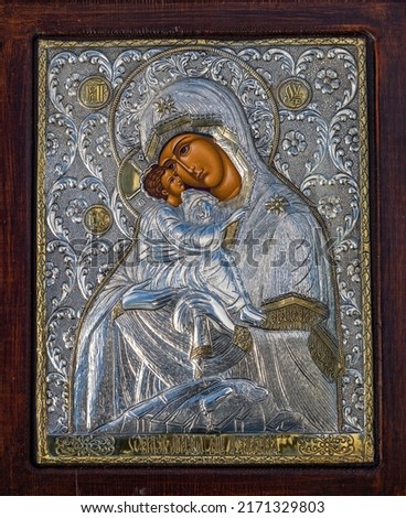 traditional orthodox icon of Mother Mary, Icon of Madonna,  Jesus, church faith concept, prayer, of Holy Mary of Magdalene, bizantine, gold background, Greece. wood table