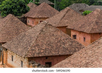 Traditional Palace Of The Fon Of Bafut With Brick And Tile Buildings And Jungle Environment, Cameroon, Africa