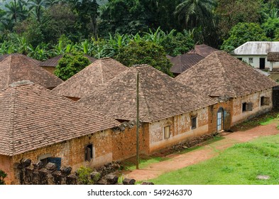 Traditional Palace Of The Fon Of Bafut With Brick And Tile Buildings And Jungle Environment, Cameroon, Africa