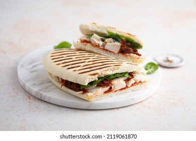 Traditional panini with chicken and tomatoes