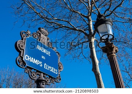 Traditional Parisian street sign of Avenue of the Champs-Elysees, one of the world most beautiful, famous and touristic avenues, in Paris, France