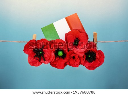 traditional patriotic italian background, with flag of Italy and craft red poppy flowers. liberation day and republic day	
