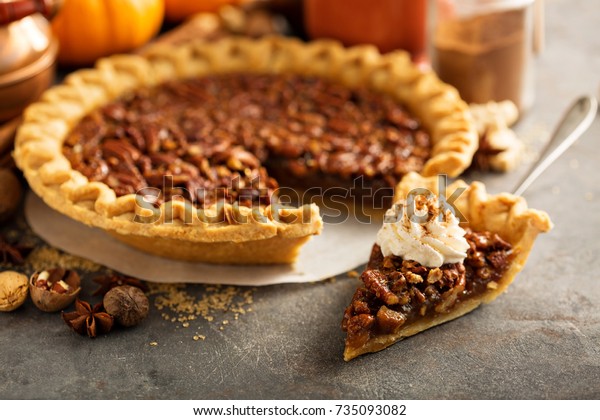 Traditional pecan pie, fall dessert concept\
for Thanksgiving