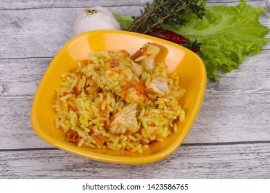 Traditional Pilaf With Chicken And Carrot Served Garlic And Thyme