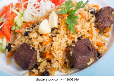Traditional pilaf with rice, meat and vegetables