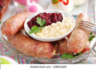 Traditional Polish White Sausage With Beetroot And Horseradish Sauce On Easter Table