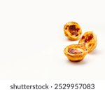 Traditional Portuguese egg tart dessert Pasteis Pastel de nata or Pasteis de Belem on white background. Local pastry cafeteria concept