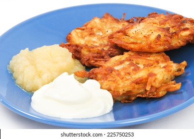 Traditional Potato Latkes Or Pancakes For Hanukkah With Side Of Applesauce And Sour Cream