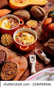 traditional pumpkin cream soup in a rustic style. healthy eating concept.