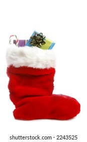 A Traditional Red Christmas Stocking Over White With Gifts