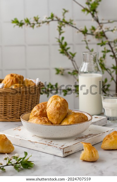 Traditional Russian pies with rice and egg.\
Russian pirozhki, homemade baked\
patties.