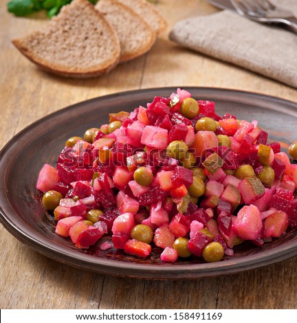 Similar – Traditional Russian salad in bowl. Olivier salad isolated